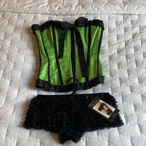 Rave Green corset with black ruffle booty shorts